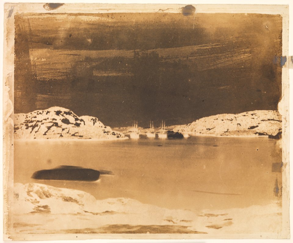 A view across a bay towards the Franklin search ships under Captain Belcher's command. RMG F6907-001