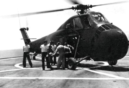 A U.S. Marine Corps Sikorsky UH-34D delivers patients to ship USS Sanctuary (AH-17) off Vietnam, in 1967