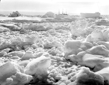 A very distant broadside view of 'Endurance' (1912) beset in ice RMG P00018