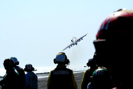 A U.S. Navy EA-6B Prowler aircraft assigned to Electronic Attack Squadron (VAQ) 134 takes off from the flight deck of the aircraft carrier USS George H.W. Bush (CVN 77) June 25, 2014, in the Persian Gulf 140625-N-CZ979-008