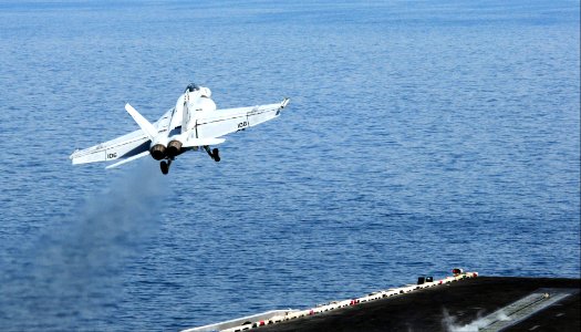 A U.S. Navy F-A-18E Super Hornet aircraft attached to Strike Fighter Squadron (VFA) 31 takes off from the aircraft carrier USS George H.W. Bush (CVN 77) in the Persian Gulf June 30, 2014 140630-N-CZ979-025