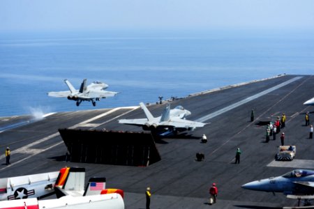 A U.S. Navy F-A-18E Super Hornet aircraft assigned to Strike Fighter Squadron (VFA) 213 takes off from the aircraft carrier USS George H.W. Bush (CVN 77) Sept 140902-N-CZ979-009