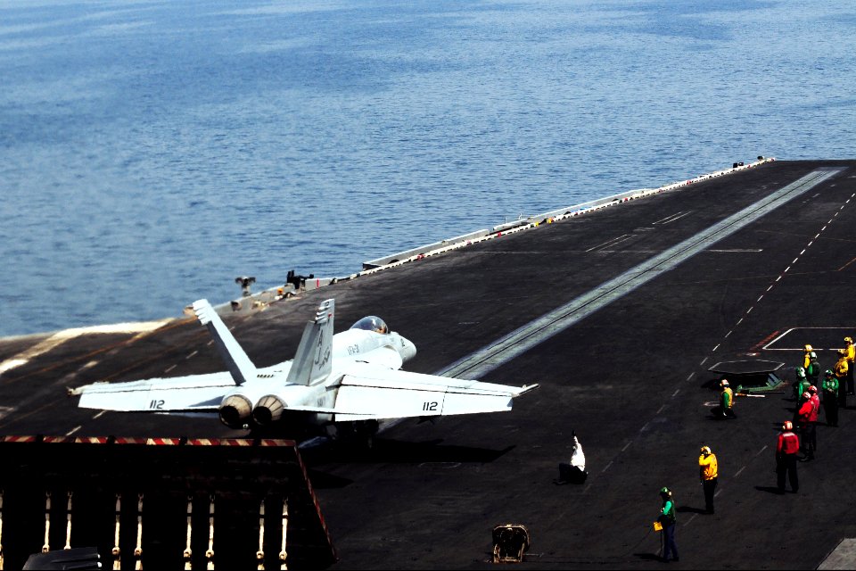 A U.S. Navy F-A-18E Super Hornet aircraft attached to Strike Fighter Squadron (VFA) 31 prepares to take off from the aircraft carrier USS George H.W. Bush (CVN 77) in the Persian Gulf June 30, 2014 140630-N-CZ979-031