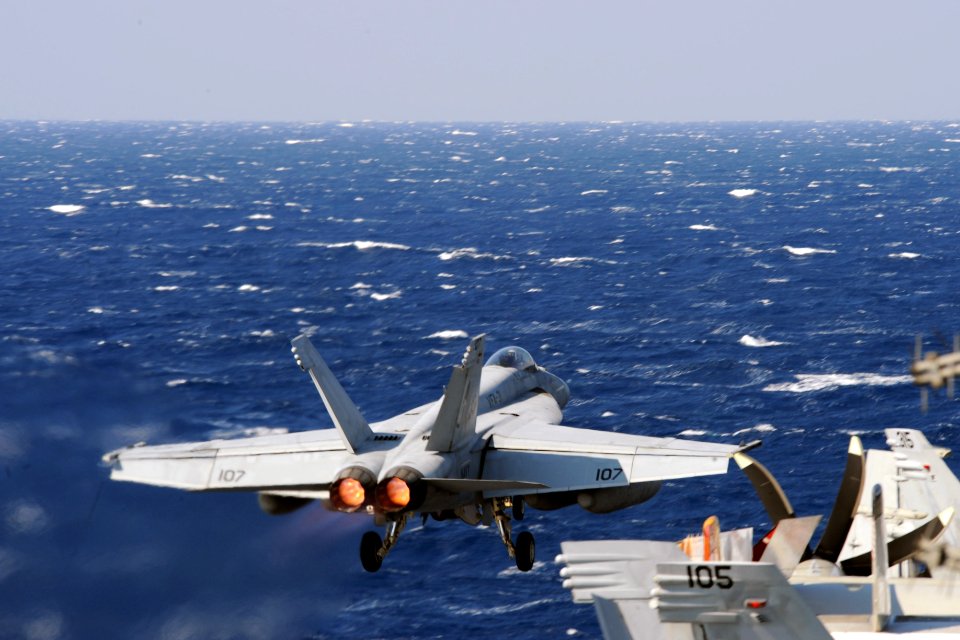 A U.S. Navy F-A-18E Super Hornet aircraft assigned to Strike Fighter Squadron (VFA) 31 takes off from the aircraft carrier USS George H.W. Bush (CVN 77) March 15, 2014, in the Mediterranean Sea 140315-N-CZ979-028