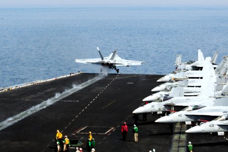 A U.S. Navy F-A-18F Super Hornet aircraft attached to Strike Fighter Squadron (VFA) 213 takes off from the aircraft carrier USS George H.W. Bush (CVN 77) in the Persian Gulf June 30, 2014 140630-N-CZ979-011