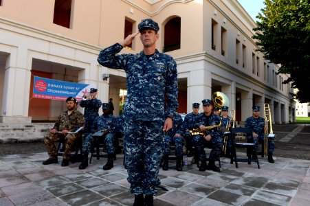 A U.S. Sailor with the U.S. Naval Forces Europe band plays taps as part of a 9-11 memorial ceremony Sept 140911-N-QY759-112
