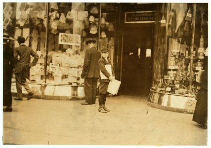A young truant selling extras during school hours Monday, April 15th, on Pennsylvania Avenue. He said, 'I heard they was extras.' I stayed out of school.' 'I am 9 yrs. Old-I mean 11.' (He LOC nclc.03784