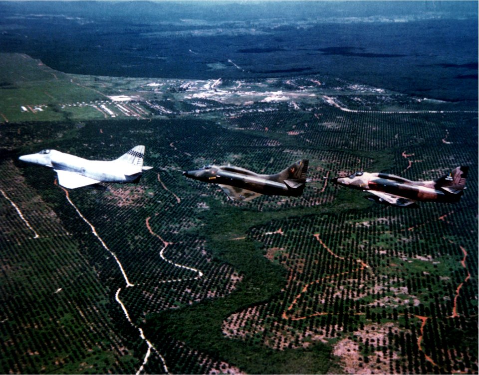A-4E of VC-5 and A-4PTMs of Royal Malaysian Air Force in flight