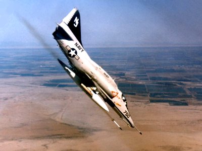 A-4F Skyhawk of VA-127 firing rockets, in the 1970s (NNAM 1996.253.5103)