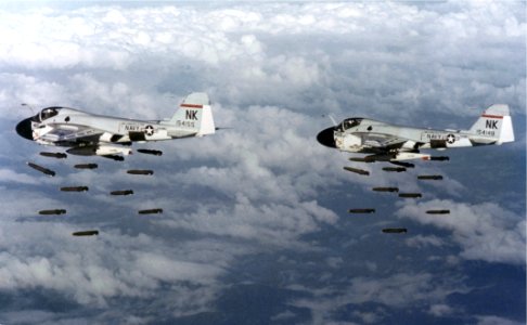 A-6A Intruders of VA-196 dropping Mk 82 bombs over Vietnam on 20 December 1968 (NNAM.1996.253.7047.013)