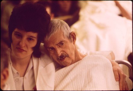 A-nurse-helps-an-elderly-patient-leave-louisville-memorial-hospital-march-1972 7651254204 o