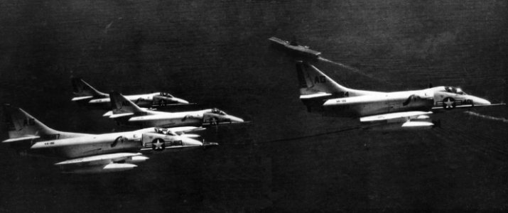 A4D-2 Skyhawks of VA-86 in flight over USS Randolph (CVA-15), circa in 1958