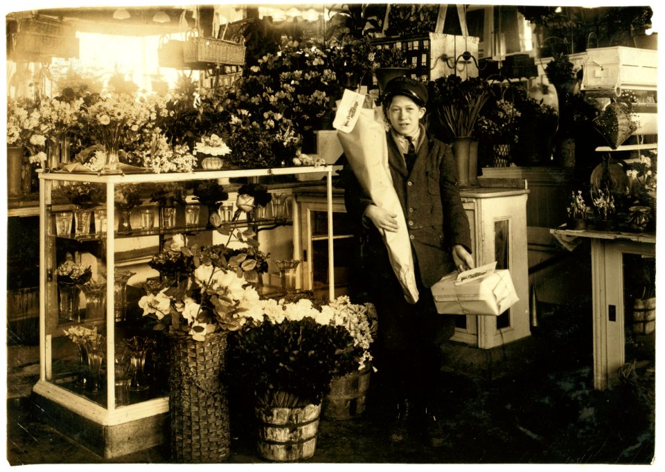 Abe Singer, 14-year old helper at Wax Florists, 143 Tremont Street. He delivers bundles, tends the door, etc. LOC nclc.05625