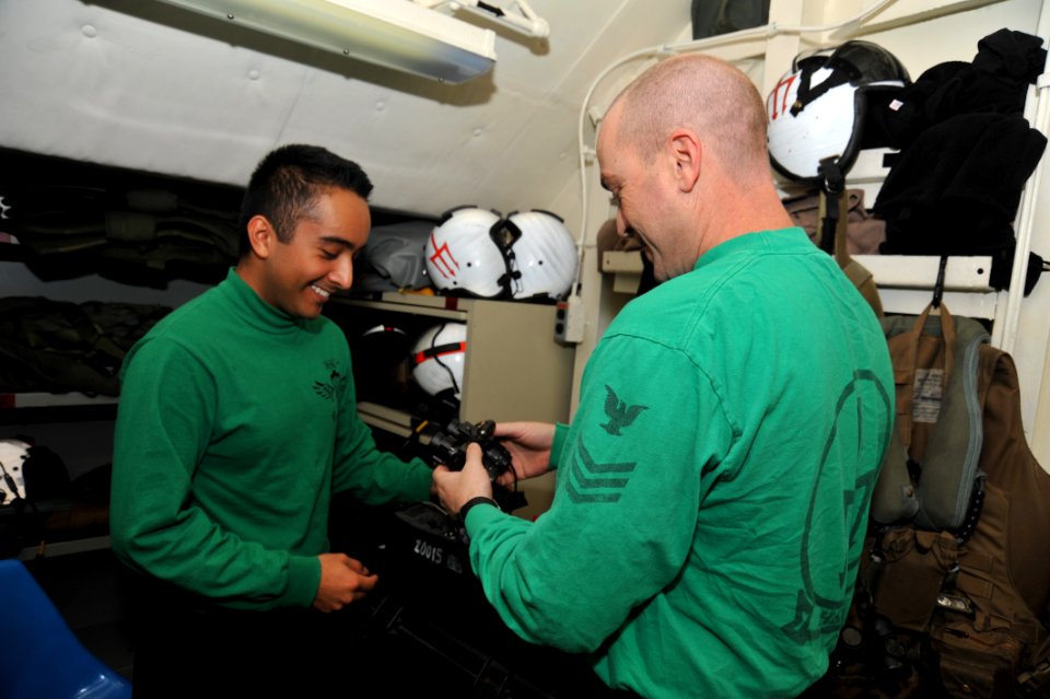 Aboard the aircraft carrier USS George H.W. Bush (CVN 77). George H.W. Bush is supporting maritime security operations and theater security cooperation efforts in the U.S. 5th Fleet area of responsibility. 140627-N-CS564-029