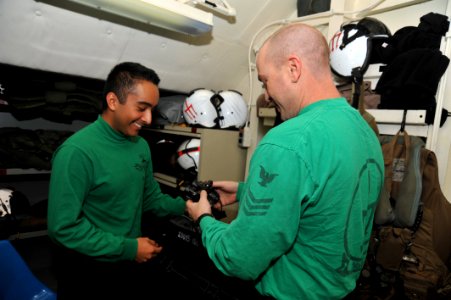 Aboard the aircraft carrier USS George H.W. Bush (CVN 77). George H.W. Bush is supporting maritime security operations and theater security cooperation efforts in the U.S. 5th Fleet area of responsibility. 140627-N-CS564-029