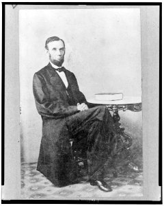 Abraham Lincoln, full-length portrait, seated, facing slightly right LCCN98510990