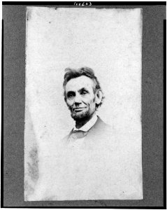 Abraham Lincoln, head-and-shoulders portrait, facing slightly left; a detail from portrait showing Lincoln seated in a chair LCCN90713137
