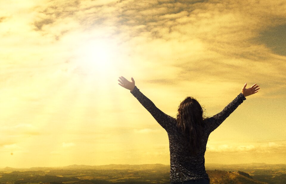 Relieved prayer open arms