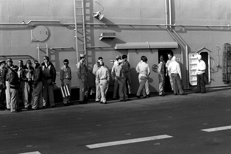 Actors during The Winds of War TV series filming aboard USS Peleliu (LHA-5) 1981