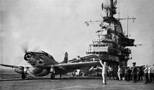 AD-5W Skyraider from VAW-12 Bats is launched from USS Randolph (CVS-15) in July 1959