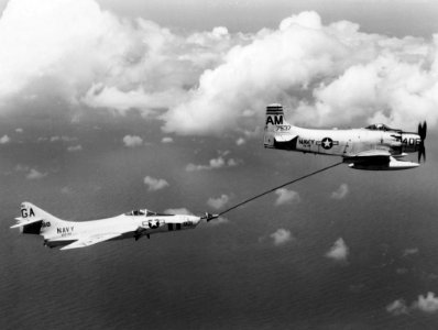 AD-6 Skyraider refueling F9F-8P Cougar 1958