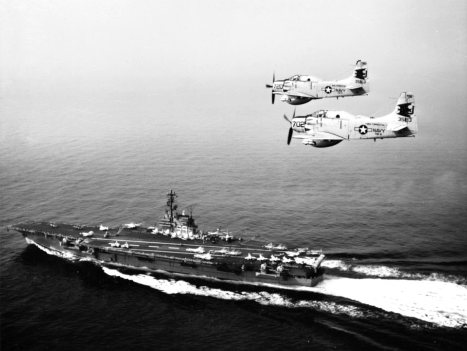 AD-5W Skyraiders of VAW-12 fly over USS Forrestal (CVA-59) on 25 April 1960