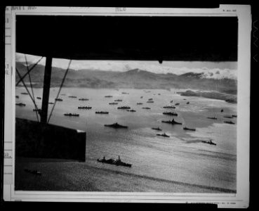 Adak Harbor in the Aleutians, with part of huge U.S. fleet at anchor, ready to move against Kiska. - NARA - 520977 photo