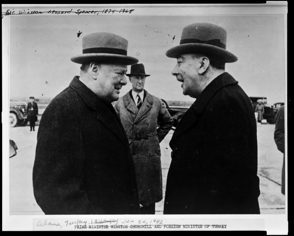 Adana, Turkey, Jan. 30, 1942. Churchill talking to Menemencioglu (Turkish Foreign Minister) at the airport on Churchill's arrival for conference with Inonu