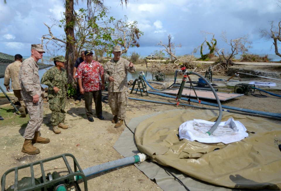 Adm. Bette Bolivar tours a water distribution center at the Garapan Fishing Basin. (19868510373)