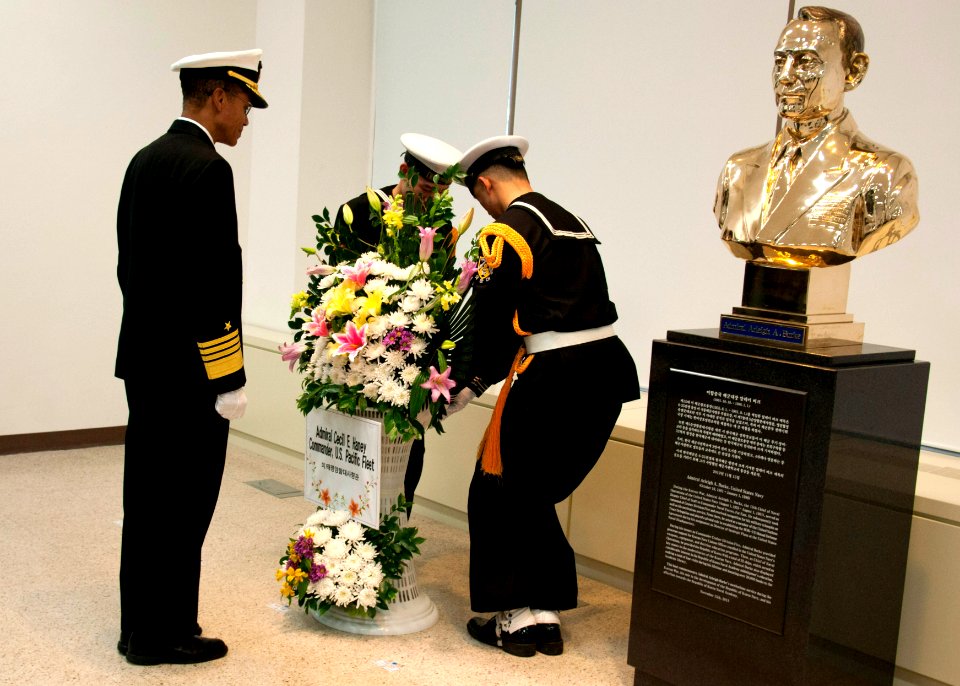 Adm. Haney helps lay a wreath at a memorial in Korea. (8510385646)