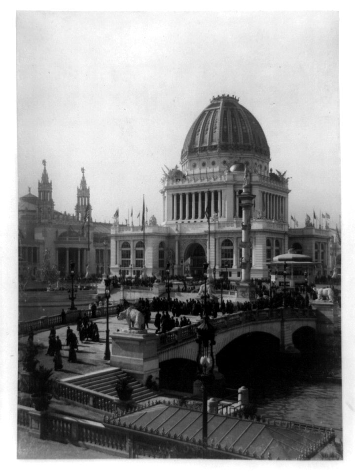 Administration Building and Machinery Hall, World's Columbian Exposition, Chicago, 1893. Bird's-eye view with many people on bridge LCCN2002716148