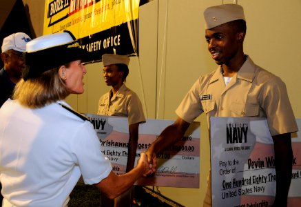 Admiral hands out scholarship money DVIDS319435