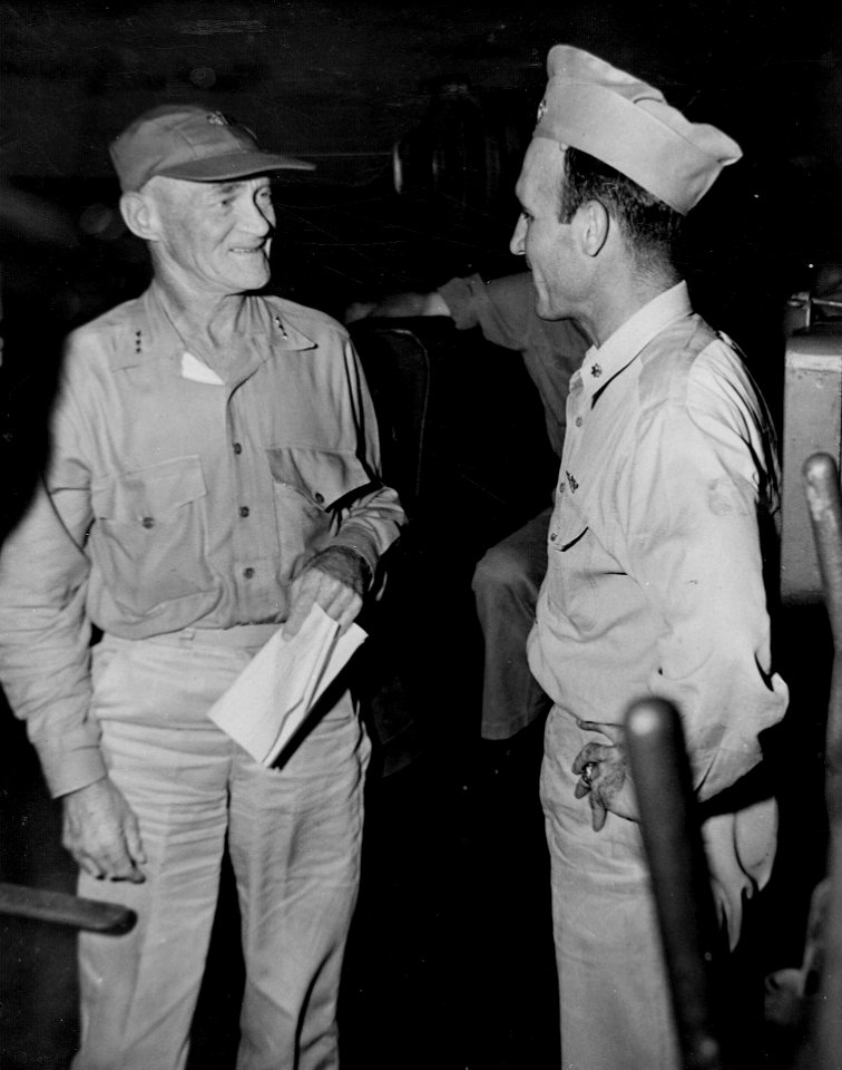 Admiral Mitscher speaking with David McCampbell