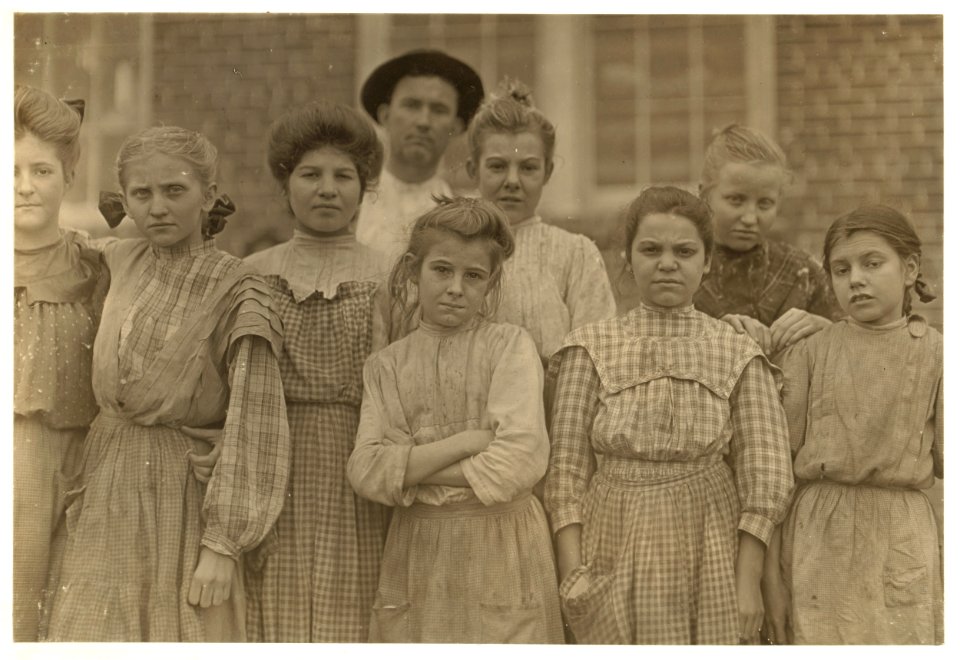 Adolescents and other in Payne Cotton Mill, Macon, Ga. Girl on end with dropping eyelids has been helping there one yr. Jan. 20, 1909. L.W. LOC cph.3a20283