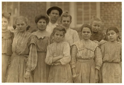 Adolescents and other in Payne Cotton Mill, Macon, Ga. Girl on end with dropping eyelids has been helping there one yr. Jan. 20, 1909. L.W. LOC cph.3a20283