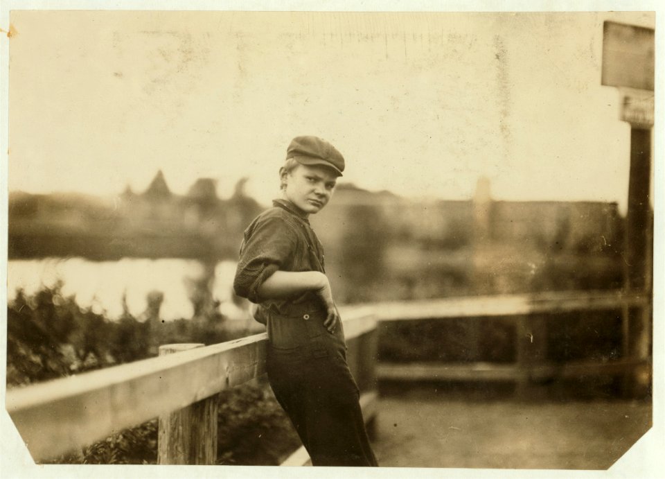 Adolescent boy (illiterate) working in cotton mill Easthampton, Mass. Compare him with photo -3033. LOC nclc.02627