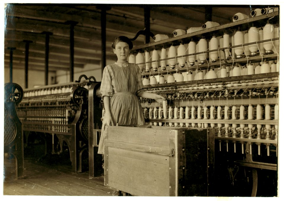 Adrienne Pagnette, an adolescent French illiterate, speaks almost no English. Is probably 14 or 15. Doffs on top floor spinning room in Glenallen Mill. Her brother Francis has a regular job LOC cph.3a18654