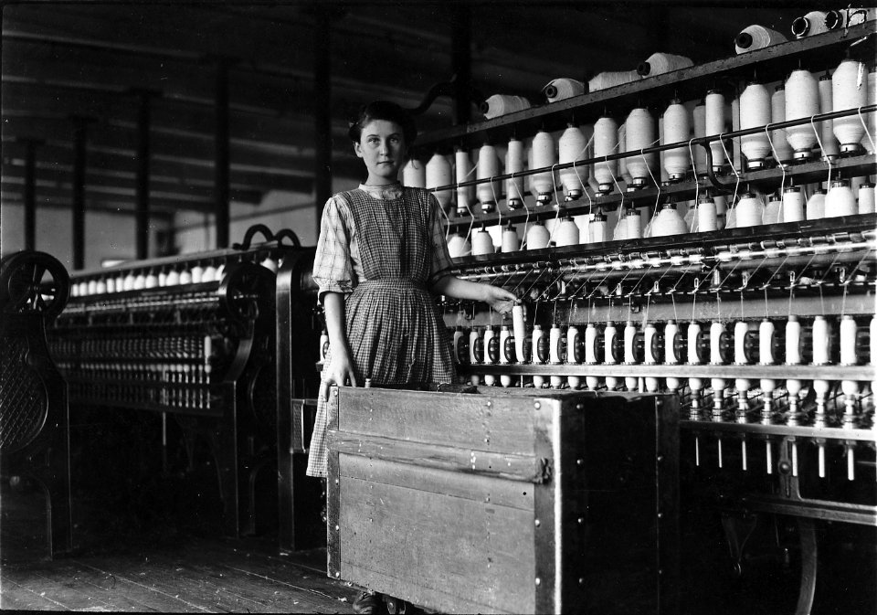 Adrienne Pagnette, and adolescent French illiterate, speaks almost no English. Is probably 14 or 15. Doffs on the top... - NARA - 523447