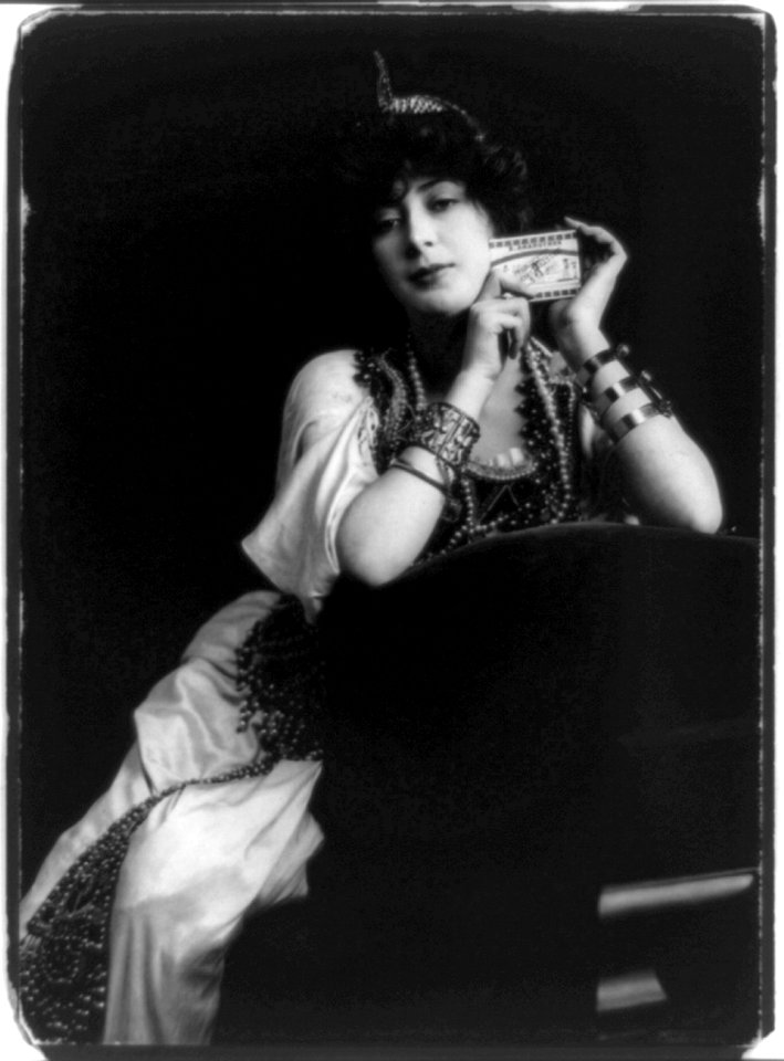 Advertisement for Egyptian Deities cigarettes, showing woman holding package of cigarettes LCCN97507995