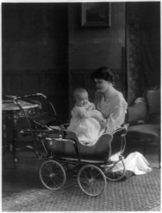 Advertisement- Woman and infant posed with a baby carriage LCCN2003655388 photo