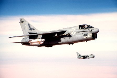 Aerial side view of two VA-72 A-7E Corsair IIs en route to target during Desert Storm DN-ST-91-05574