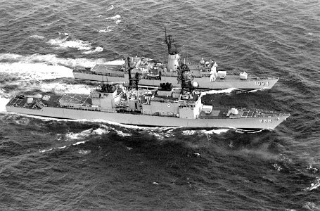 Aerial starboard beam view of USS Pharris (FF-1094) and USS Arthur W. Radford (DD-968) underway during Unitas XXI 1980 DN-SN-83-00276