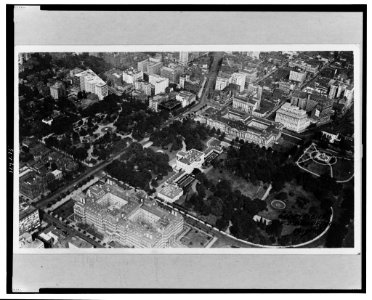 Aerial view of the White House, the Treasury, the Old Executive Office Building and surrounding area, Washington, D.C. LCCN99472496