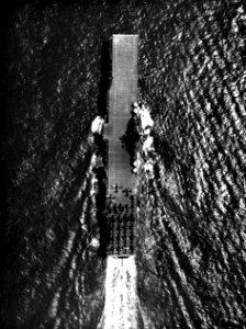Aerial view of USS Intrepid (CV-11) underway at sea, in 1945