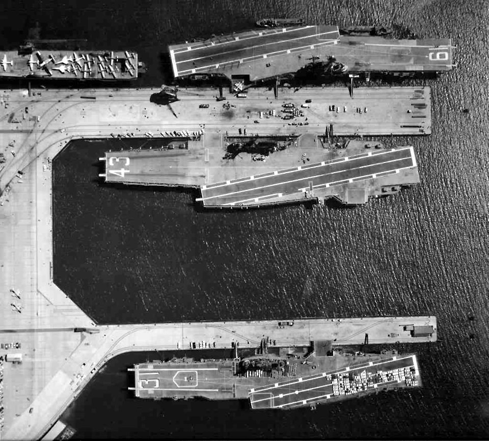 Aerial view of USS Hancock (CVA-19), USS Bon Homme Richard (CVA-31) and USS Coral Sea (CVA-43) in 1966