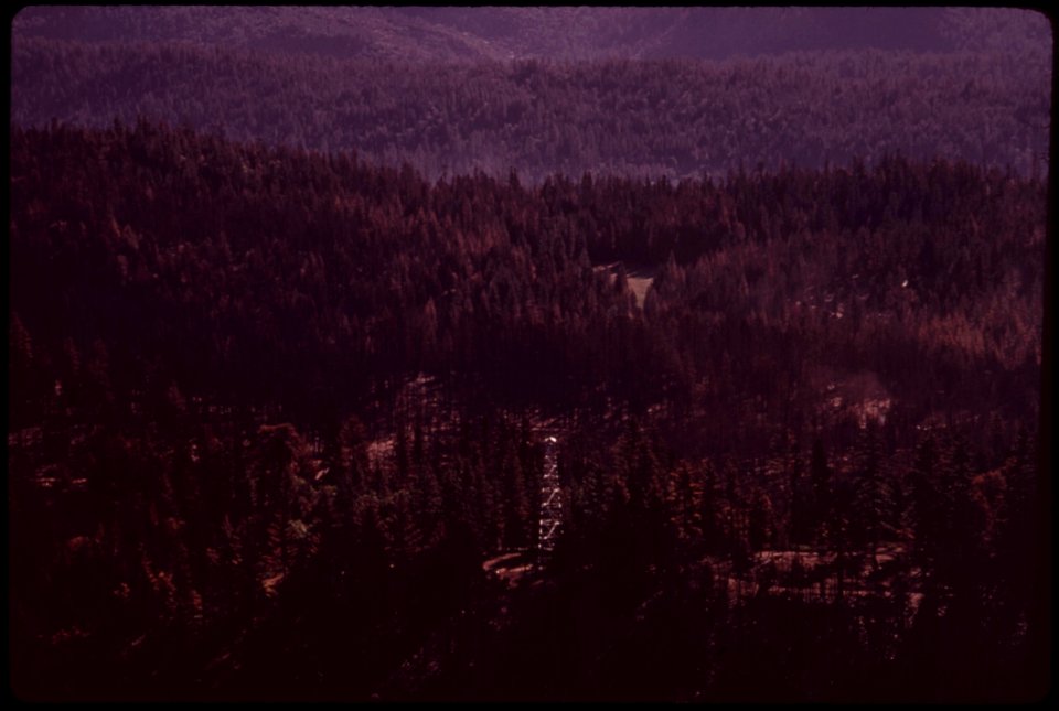 Aerial-view-shows-the-woods-river-forest-service-fire-lookout-although-in-the-center-of-the-burn-area-the-lookout-was-unharmed-september-1973 7153074637 o
