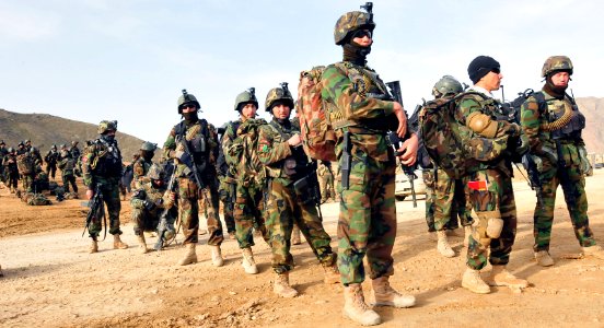 Afghan commandos stand ready to board an MI-17 transport helicopter (4422961194)