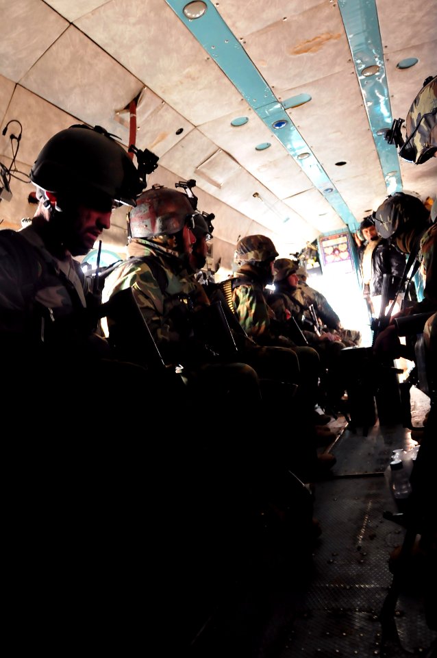 Afghan commandos fill the cabin of an MI-17 Transport helicopter (4422969092)