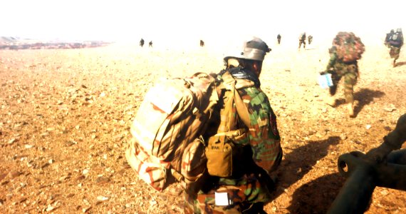 Afghan commandos quickly disembark and MI-17 transport helicopter (4422975654)