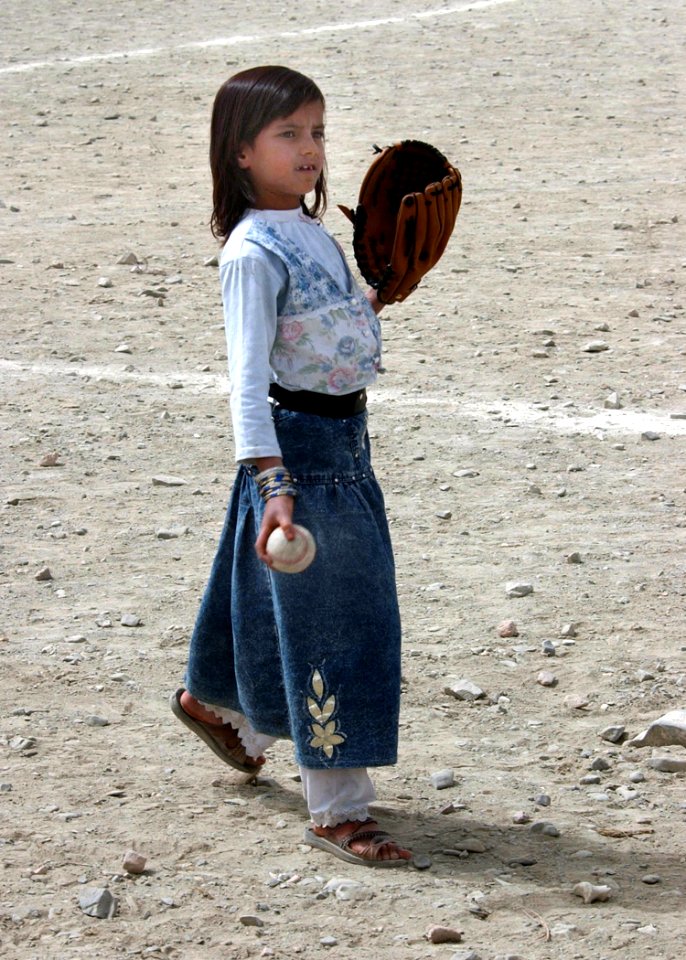 Afghan girl playing baseball in 2002